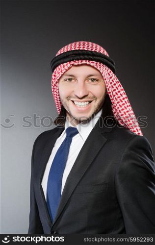 Arab businessman againt grey background