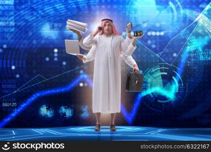 Arab businessman in multitasking concept