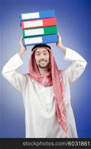 Arab businessman with office folders