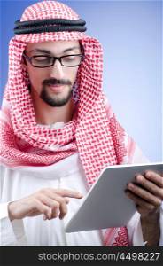 Arab businessman with tablet computer