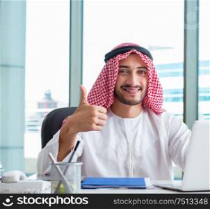 Arab businessman working in the office. The arab businessman working in the office