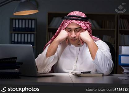 Arab businessman working late in office