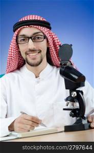 Arab chemist working in lab