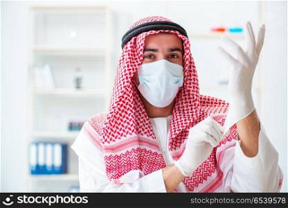 Arab chemist working in the lab office