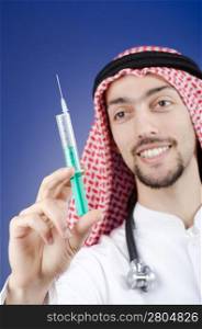 Arab doctor with syringe