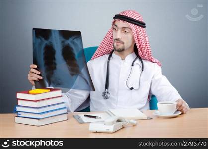 Arab doctor with x-ray print