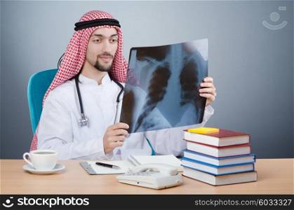 Arab doctor with x-ray print