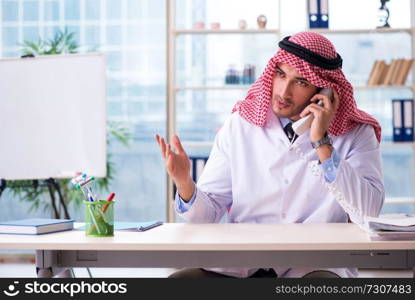 Arab doctor working in the clinic 