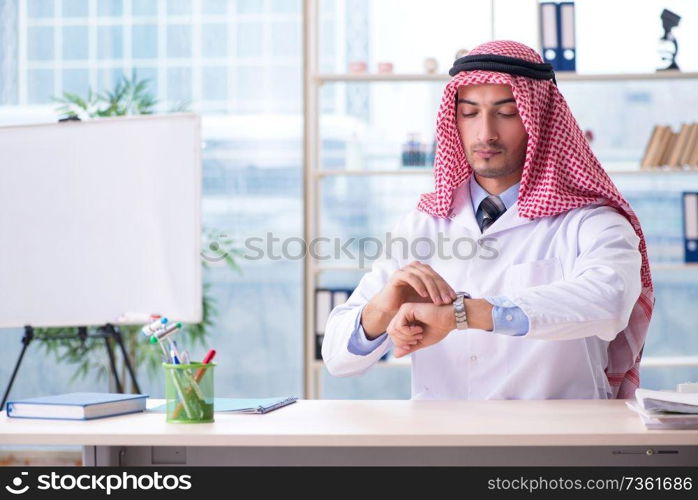 Arab doctor working in the clinic 