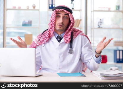 Arab doctor working in the clinic 