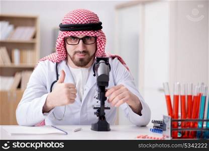 Arab doctor working in the lab hospital