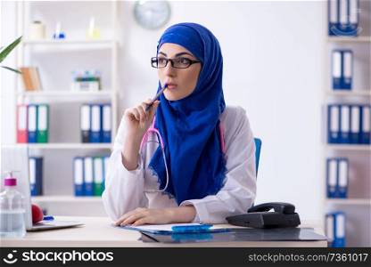 Arab female doctor working in the clinic 