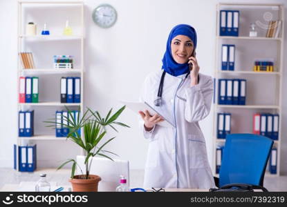 Arab female doctor working in the clinic 