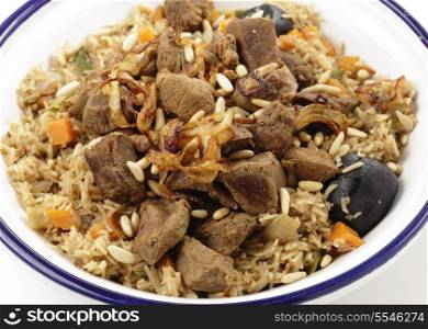 Arab Gulf beef kabsa, also known as majbus, served in a Tunisian tagine bowl. Kabsa, a biryani-like speciality of the Gulf, is a staple food for the arabs