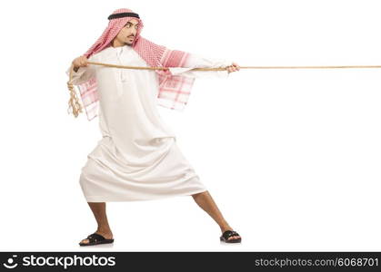 Arab man in tug of war concept