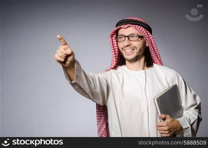 Arab man pressing virtual button