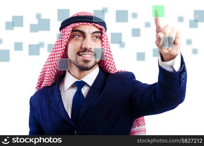 Arab man pressing virtual buttons