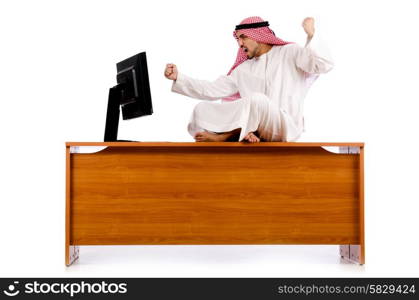 Arab man sitting at his desk