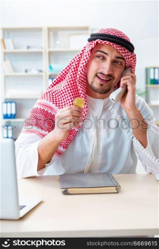 Arab man with bitcoin in cryptocurrency mining concept