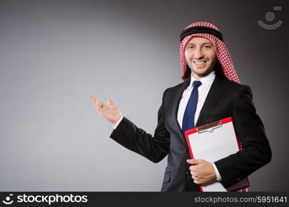 Arab man with paper binder