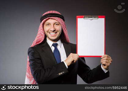 Arab man with paper binder