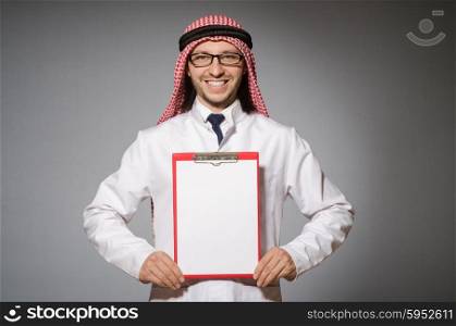 Arab man with paper binder