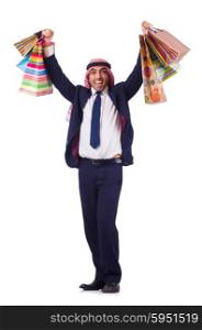 Arab man with shopping gifts on white