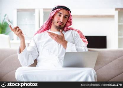 Arab man working at home on his work