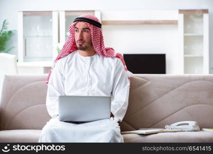 Arab man working at home on his work