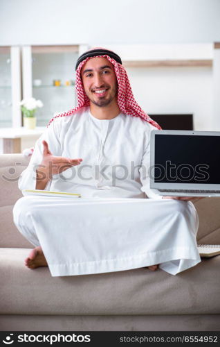 Arab man working at home on his work