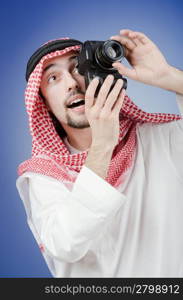 Arab photographer in studio shooting