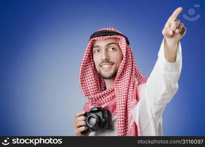 Arab photographer in studio shooting