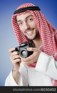 Arab photographer in studio shooting