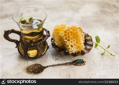 arabic tea glass with honeycomb table
