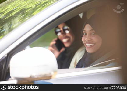 Arabic Woman Couple Traveling By Luxury Car in Saudy Arabia