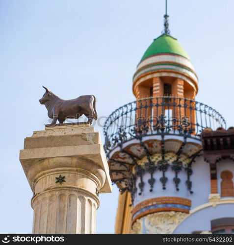 Aragon Teruel El Torico statue and modernist building in Plaza Carlos Castel square at Spain