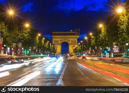 Arc de triomphe Paris (Arch of Triumph and Champs Elysees) at sunset