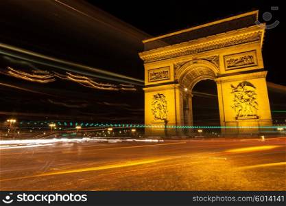 Arc of Triumph in Avenue of Champs-Elysees at night