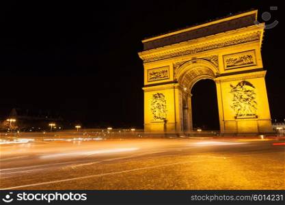 Arc of Triumph in Avenue of Champs-Elysees at night