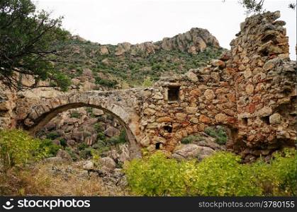 Arch and ruins of Yediler monastery near Bafa lake, Turkey