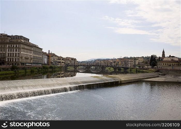 Arch bridge across a river, Arno River, Florence, Italy