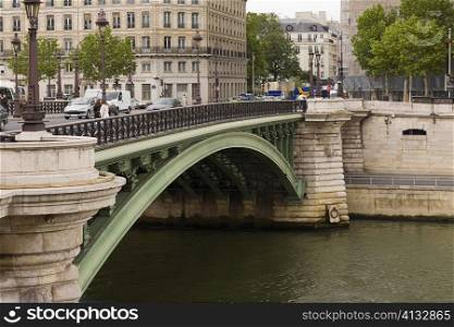 Arch bridge over a river, Paris, France