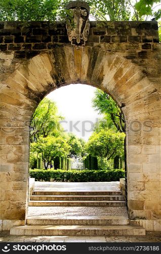 Arch of stone in entrance to Hort del Rei gardens Palma de Mallorca near Almudaina
