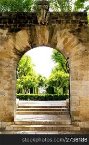 Arch of stone in entrance to Hort del Rei gardens Palma de Mallorca near Almudaina