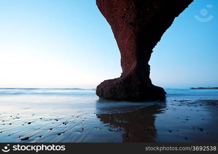 Arch rock formation on the beach, Morocco