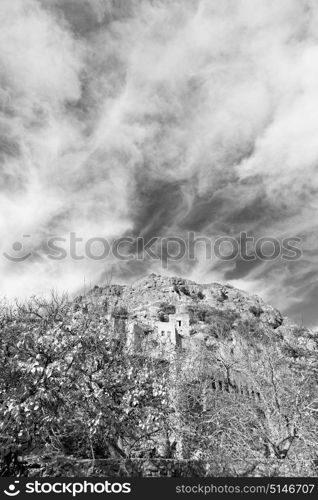 arch village house and cloudy sky in oman the old abandoned