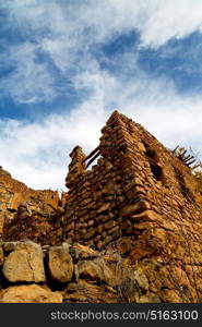 arch village house and cloudy sky in oman the old abandoned