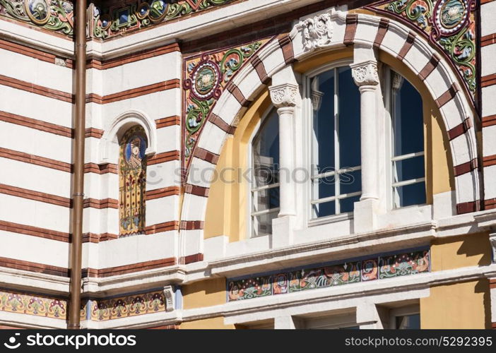 Arched window with colorful ornaments of beautiful building