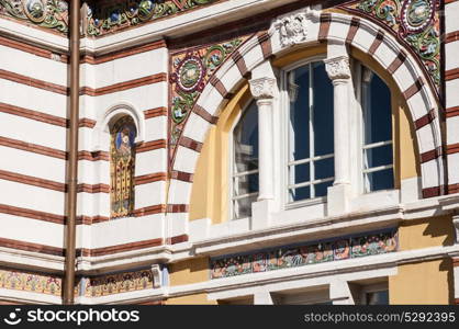 Arched window with colorful ornaments of beautiful building