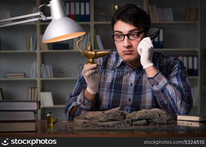 Archeologist working late night in office